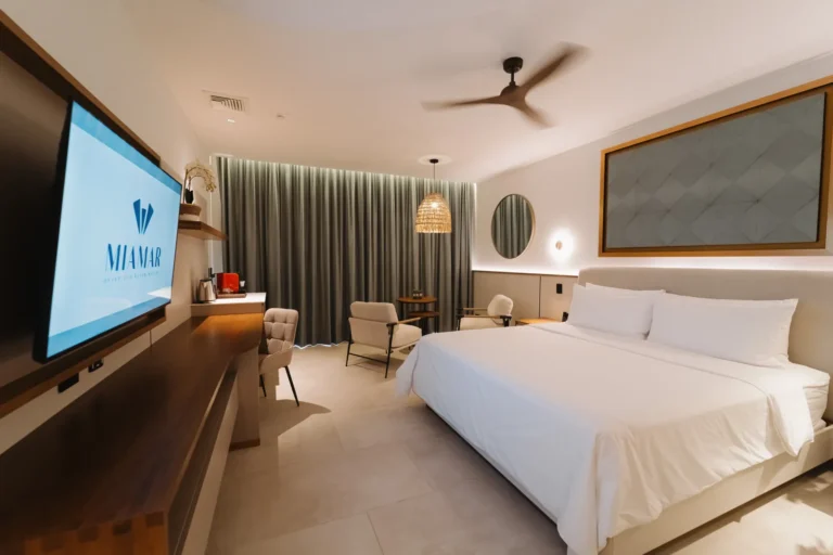 A Miamar suite with a king bed and a private terrace